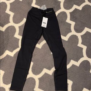 Whitney Simmons black leggings